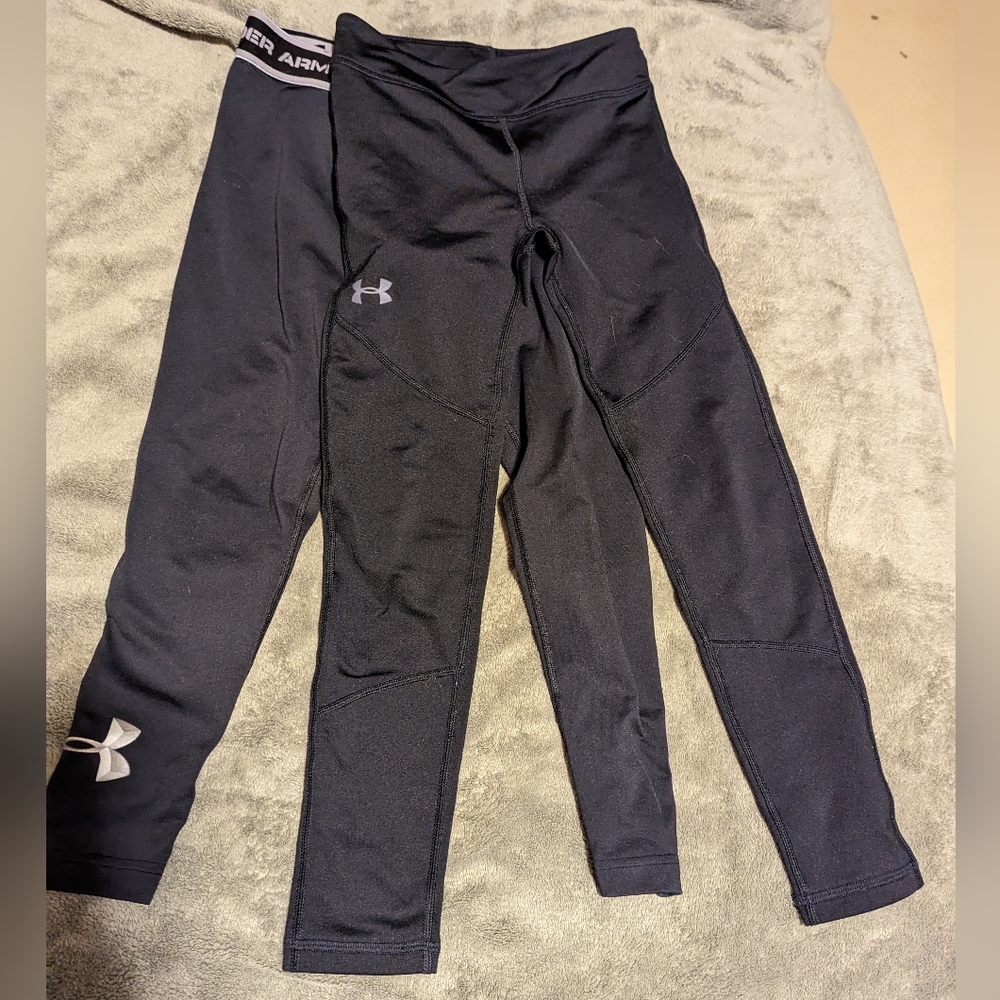 2 pairs black youth Under Armour pants, Small